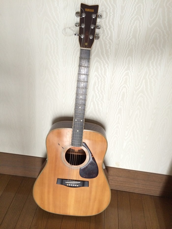 It's got a huge gash in the top, but sounds pretty good.